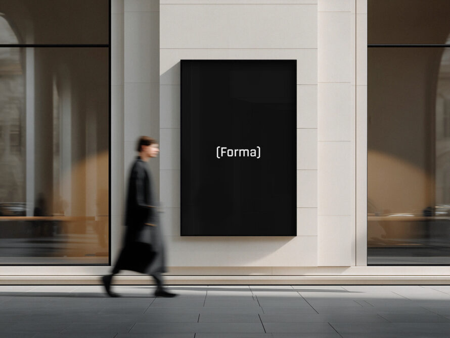 Minimalist storefront display with solid black frame mounted on beige tile wall
