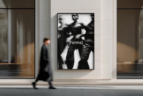 Motion blur photo in black frame mounted on minimal white storefront