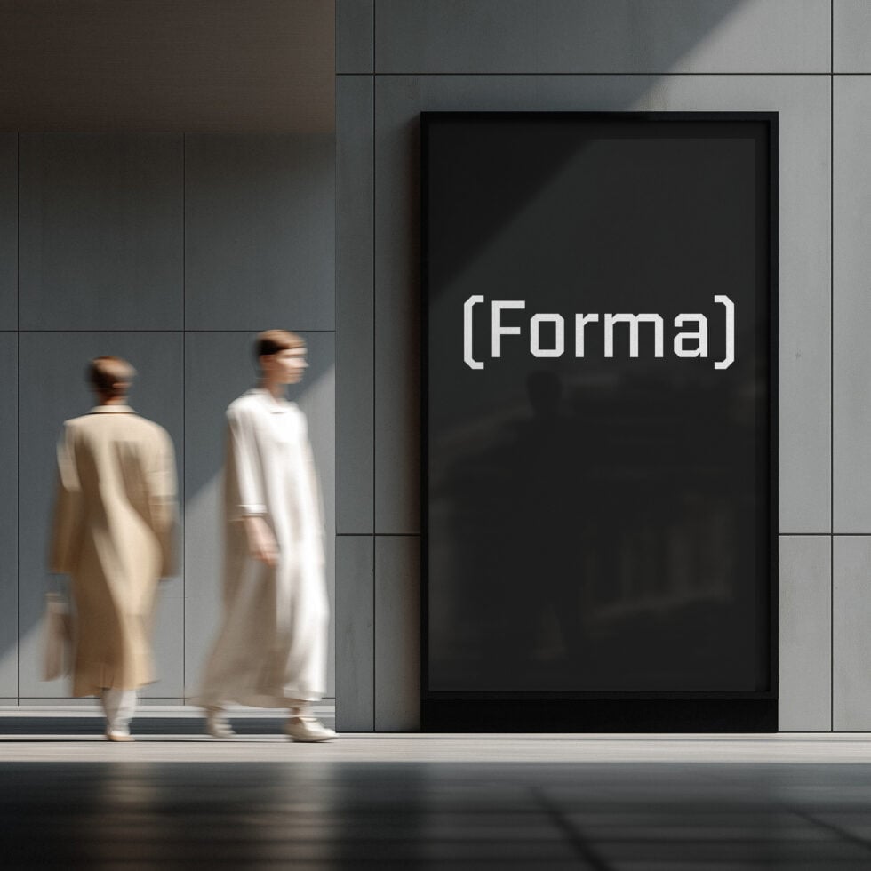 Tall black portrait frame on minimal gallery wall with two blurred figures walking past in neutral tones