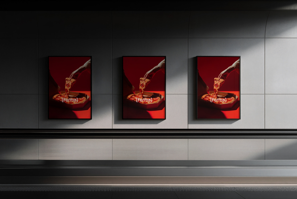 Three framed posters of liquid splash artwork hung on white wall