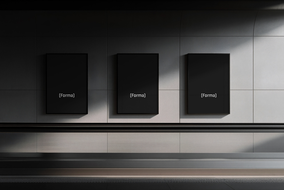 Three empty black frame mockups mounted on minimal gallery space