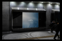Modern storefront display mockup with blue gradient screen in urban setting