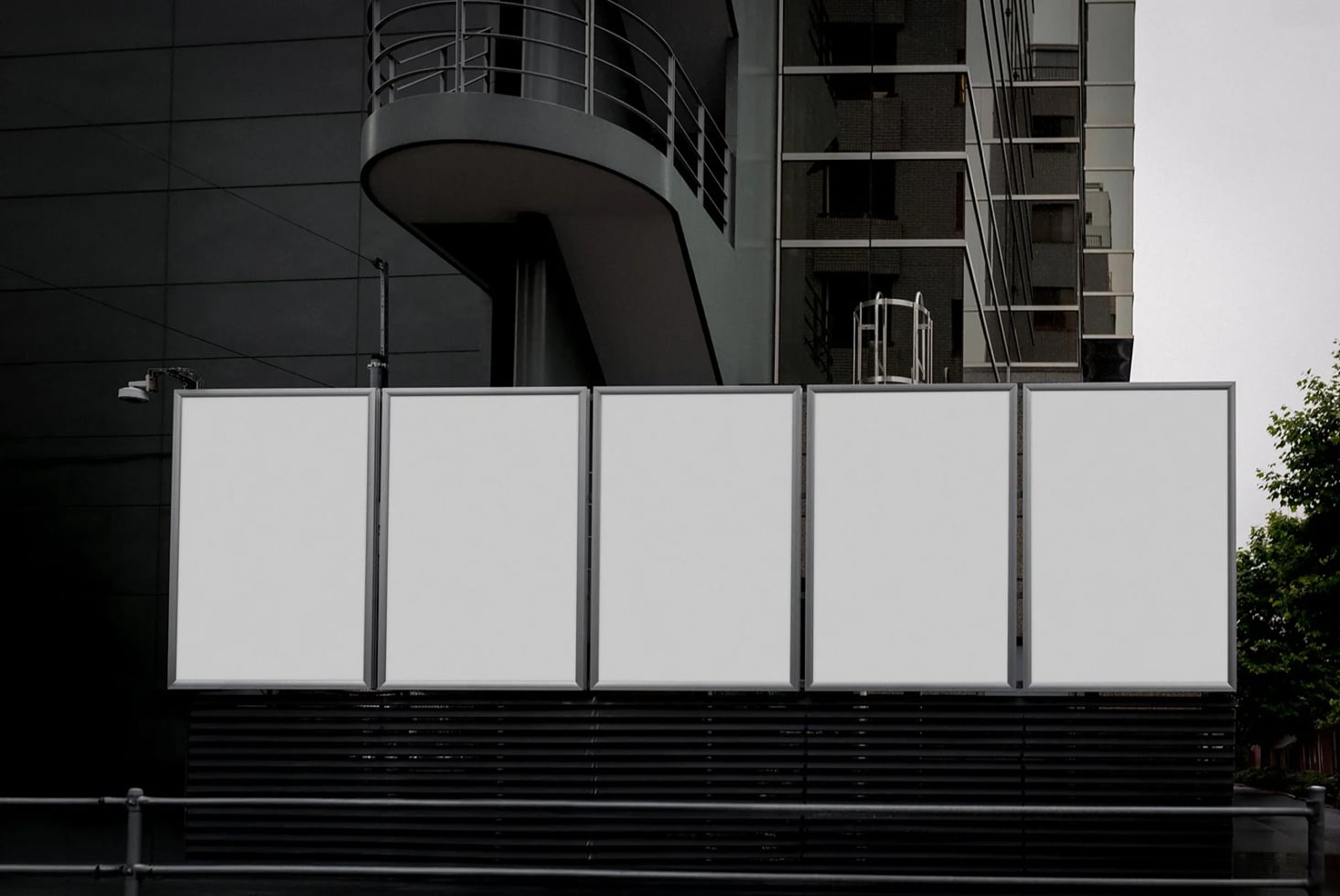 Five blank billboard panels on urban storefront with modern architecture backdrop