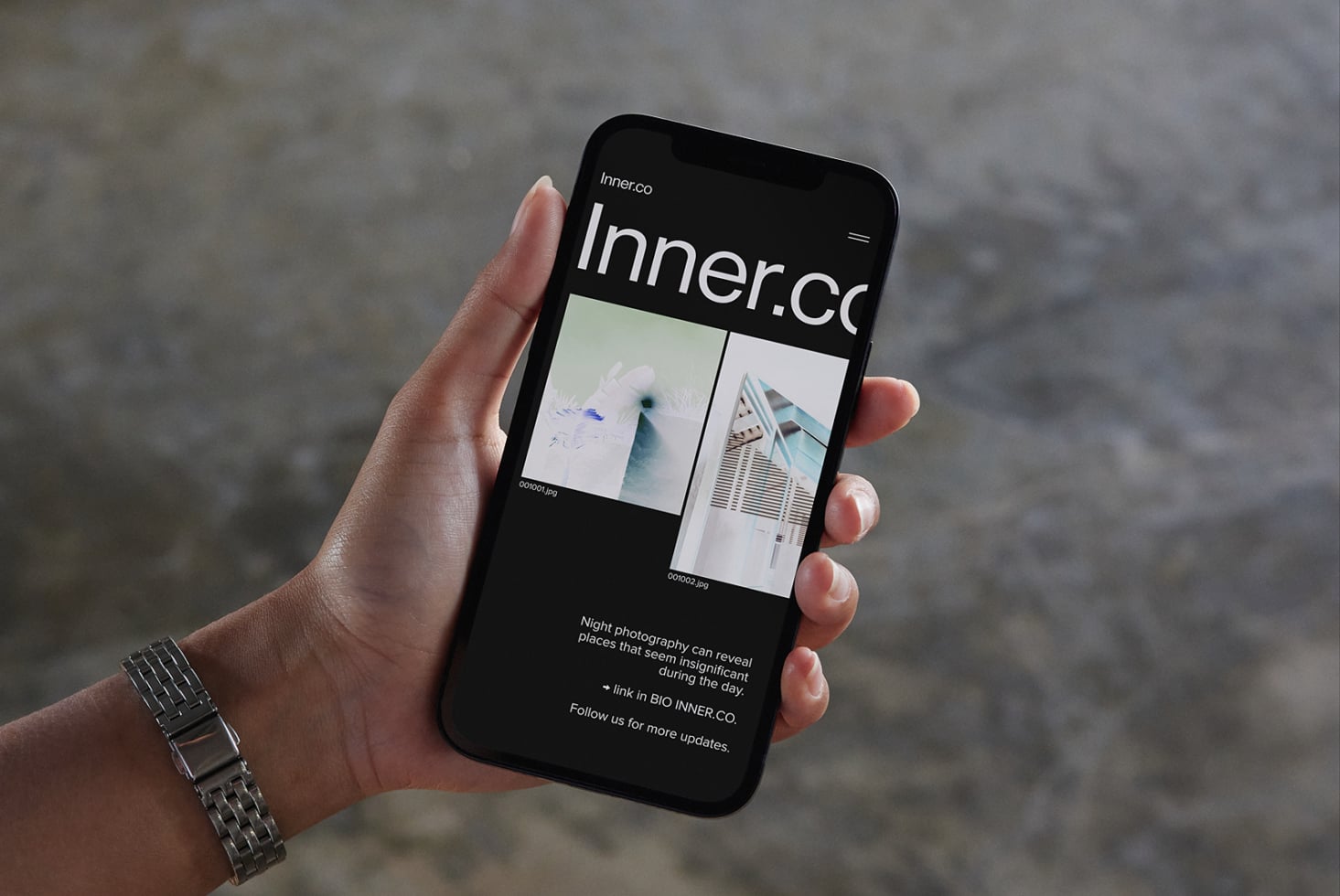 Inner.co dark mode site on phone displaying photo gallery with mountain images