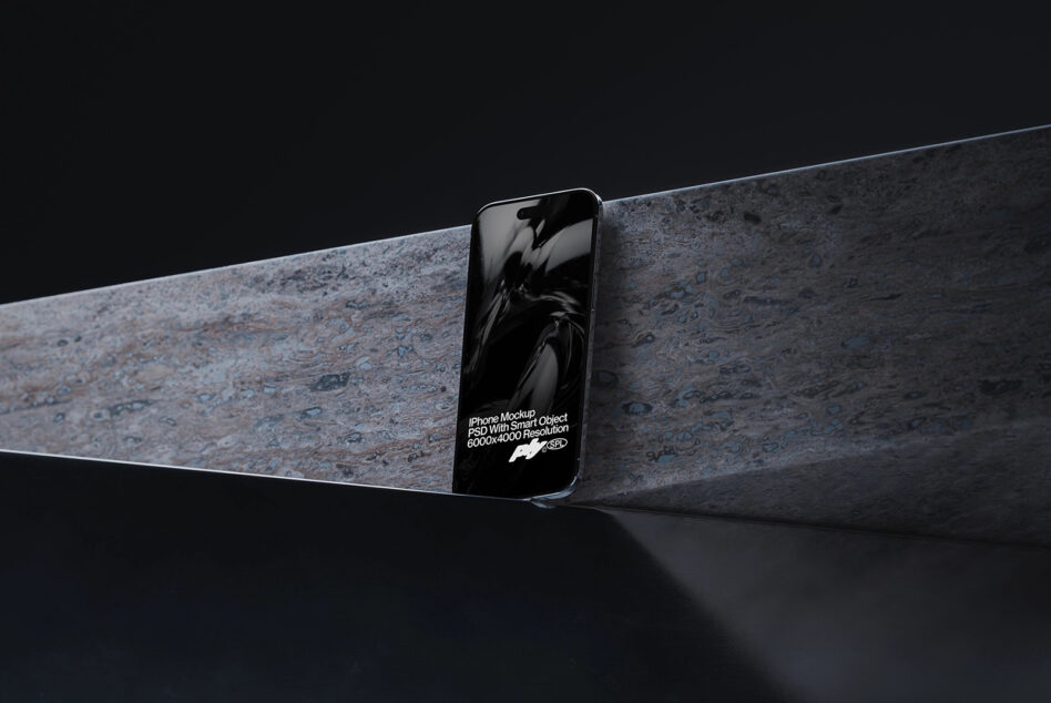 Phone with text overlay positioned on rough concrete architectural element dark scene
