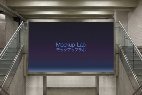Underground transit billboard with dark blue background lit by spotlights