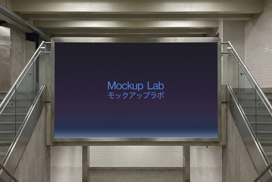 Underground transit billboard with dark blue background lit by spotlights