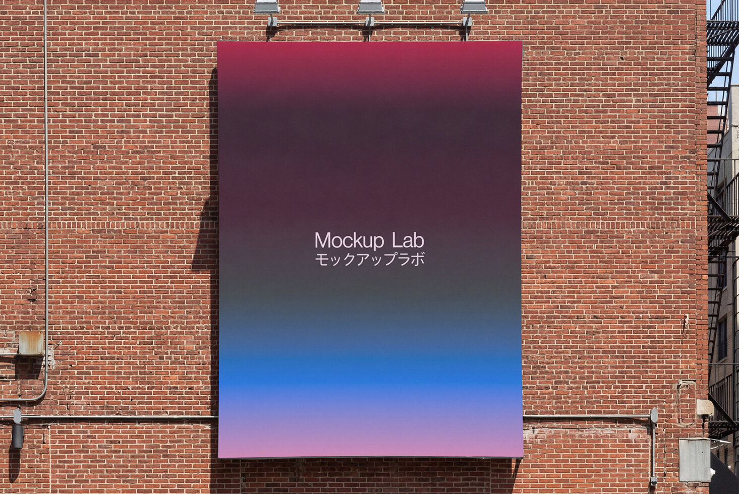 Wall banner with gradient from maroon to pink purple on brick facade