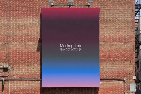 Wall banner with gradient from maroon to pink purple on brick facade