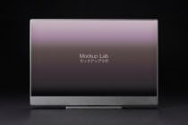 Desktop monitor with mauve gradient background displaying bilingual text
