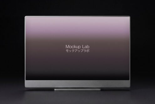 Desktop monitor with mauve gradient background displaying bilingual text