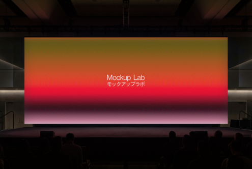 Large cinema screen displaying gradient from orange to pink with Mockup Lab text