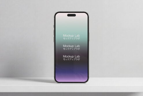 iPhone mockup with mountain landscape photo on screen