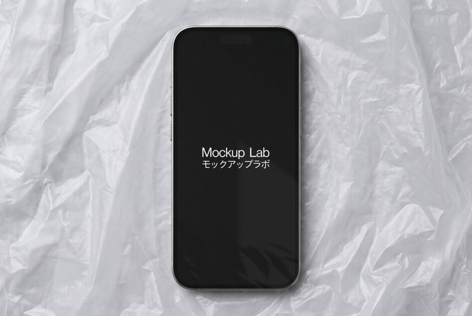 iPhone 14 Pro with black screen displaying Mockup Lab text on white textured background