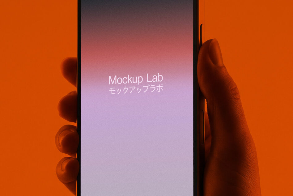 Hand gripping smartphone with soft gradient mockup on orange studio backdrop