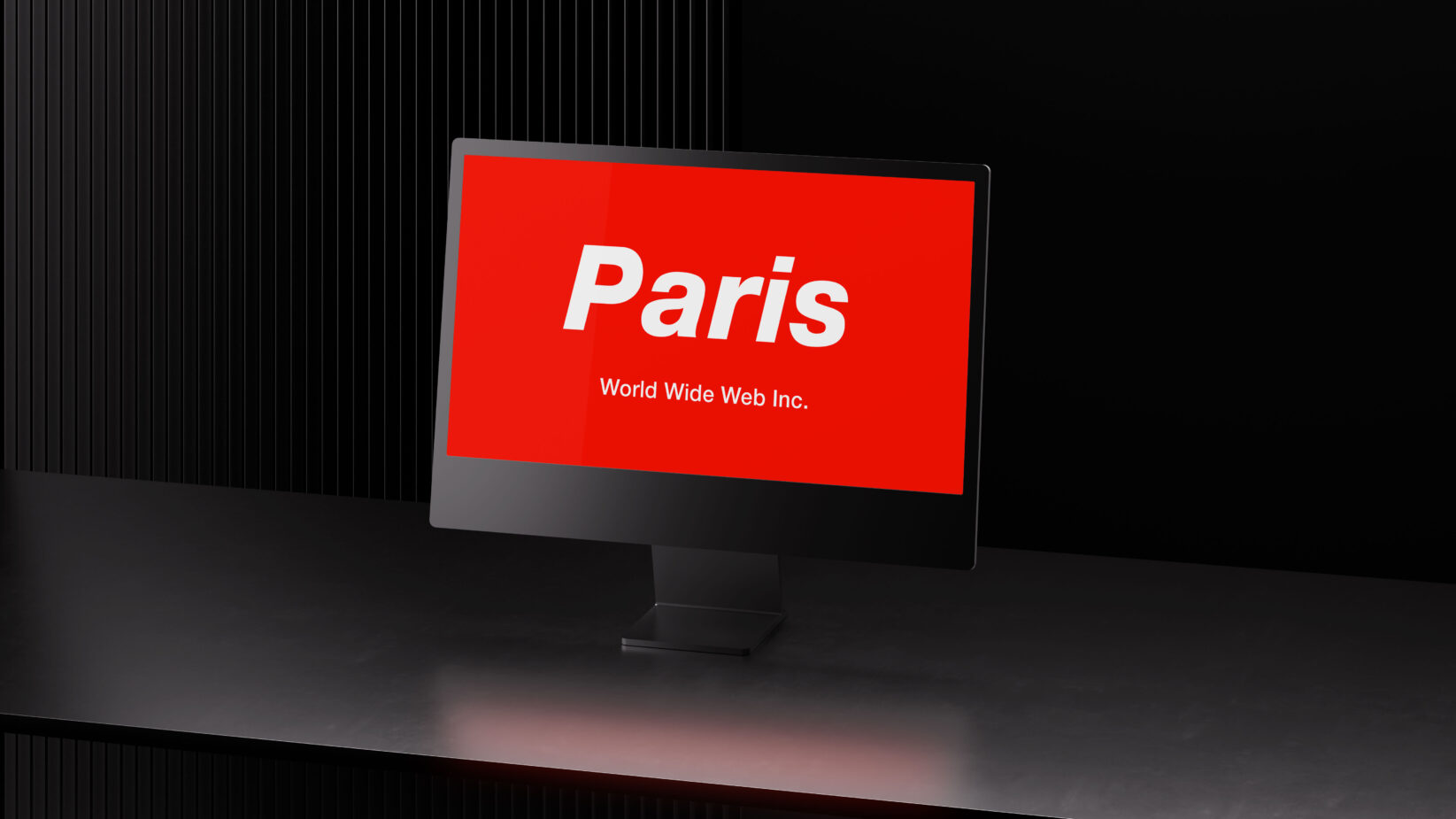 Monitor mockup displaying Paris branding in white italic text on red background