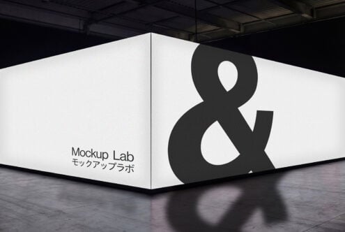 Large warehouse billboard with ampersand symbol in black on white background