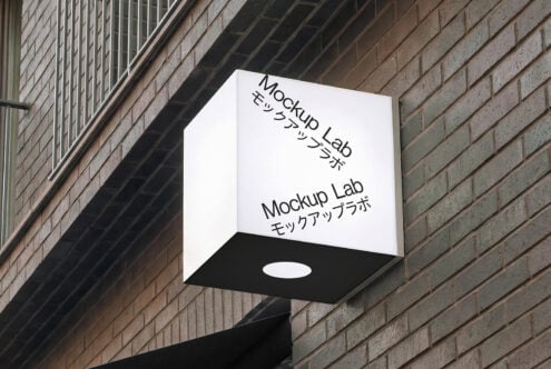 3D cube storefront sign with Mockup Lab text displayed on two visible sides