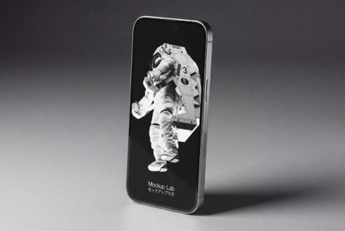Phone screen showing astronaut in NASA suit against black background