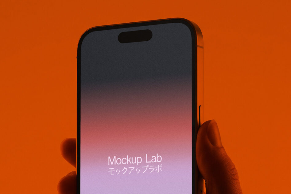 Person holding phone with pink gradient display against orange backdrop