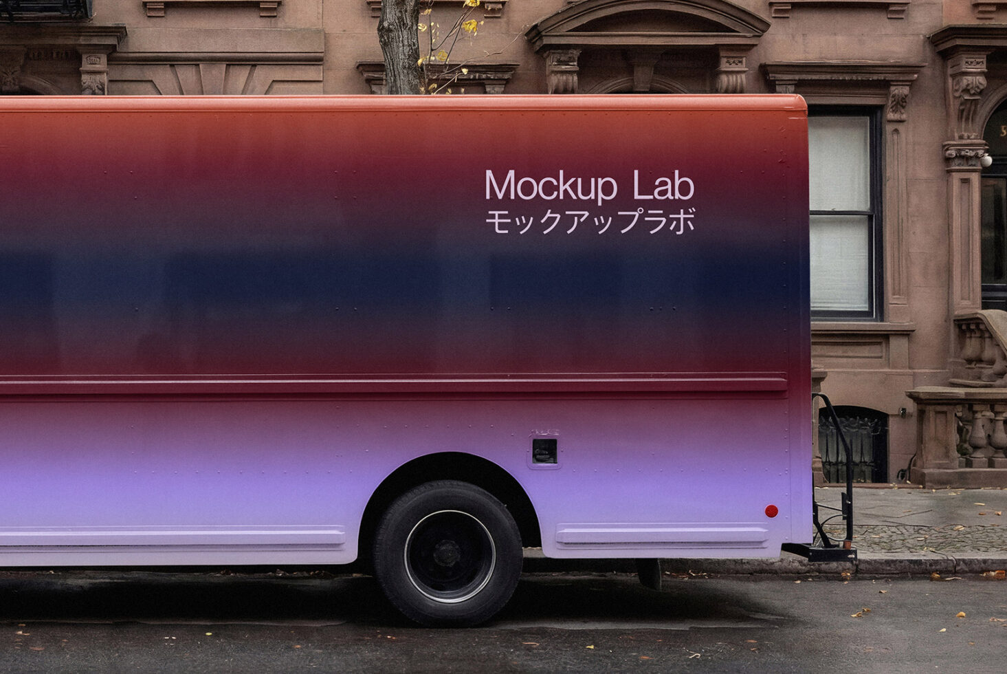 Purple gradient delivery truck with Mockup Lab branding on brick building
