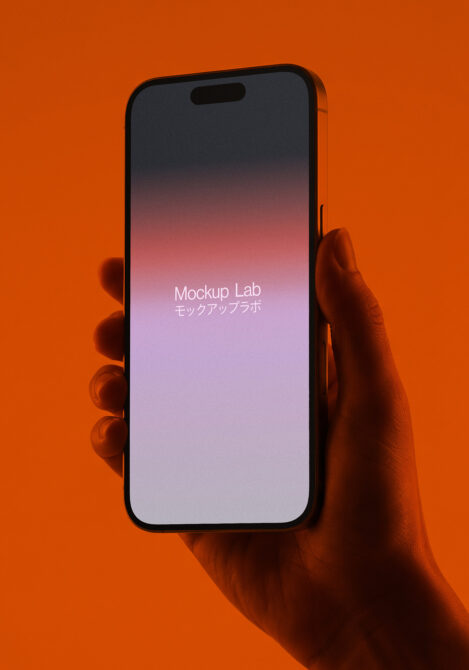 Hand holding phone with gradient screen on bright orange background