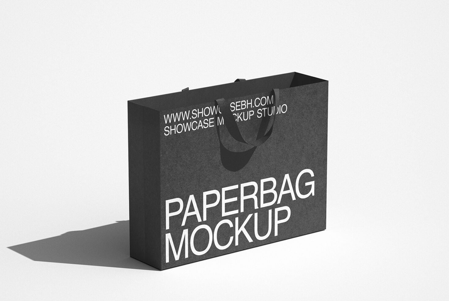 Dark gray paper shopping bag mockup with rope handles