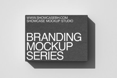 Dark gray box mockup with bold white branding typography on textured surface