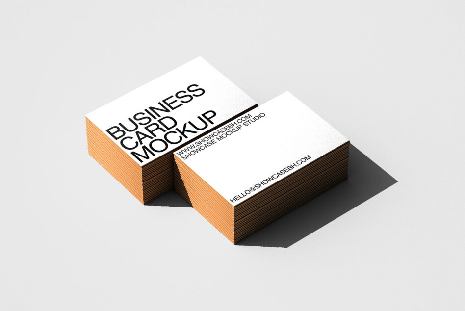 Stacked business cards mockup with orange edge detail on white background