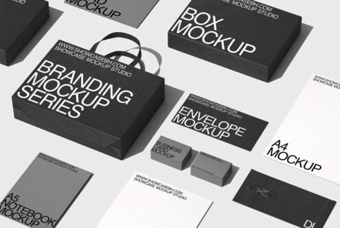 Black branding mockup set with boxes, cards, envelopes arranged flat lay