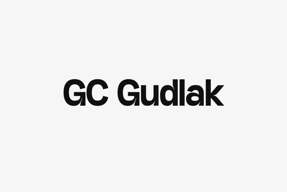 Heavy weight sans serif font displaying GC Gudlak in large black characters