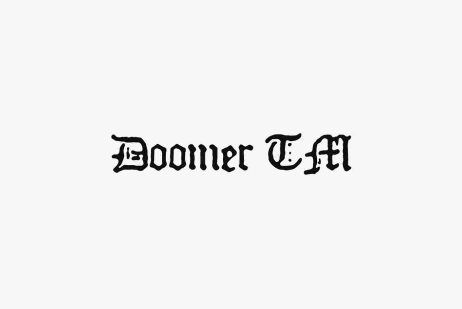 Doomer EFM blackletter typeface on light background minimalist specimen