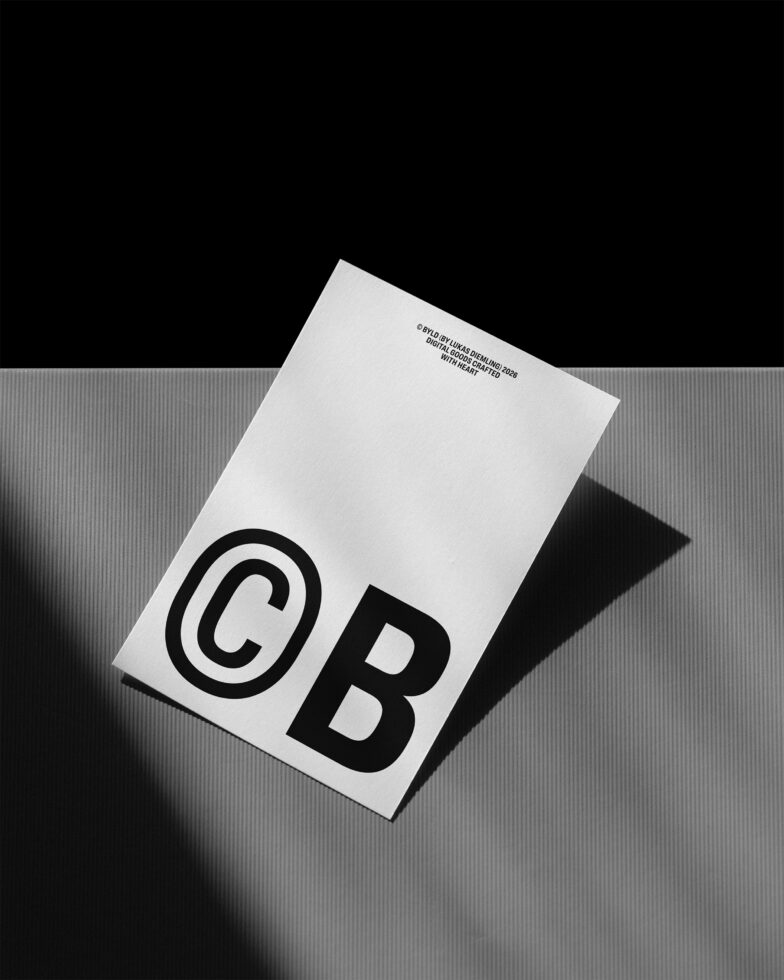 White DIN A business card mockup with copyright symbol in black on textured grey