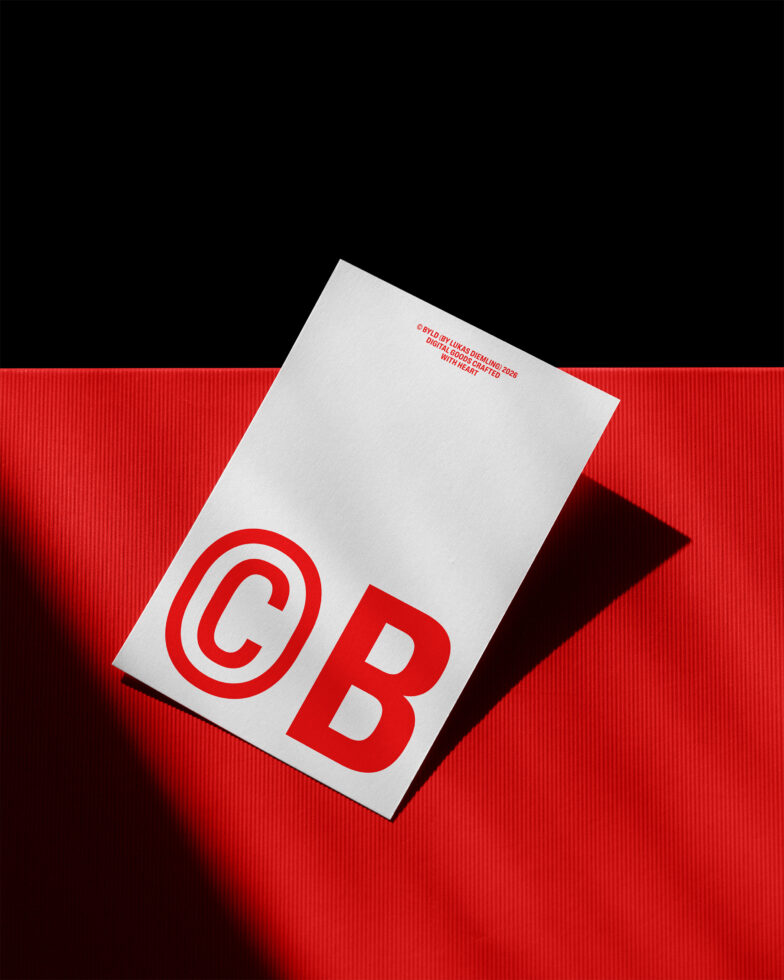 White DIN A card mockup with red copyright symbol on bold red ribbed surface
