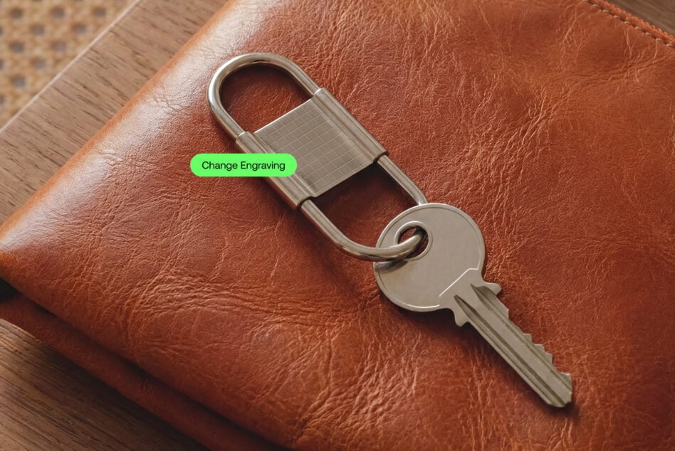 Leather keychain with metal padlock on cognac wallet, editable engraving area