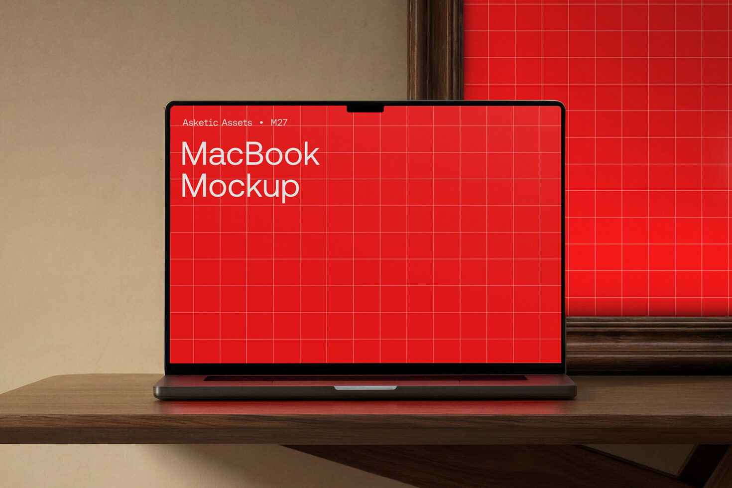 MacBook mockup on wood desk with bright red grid screen background