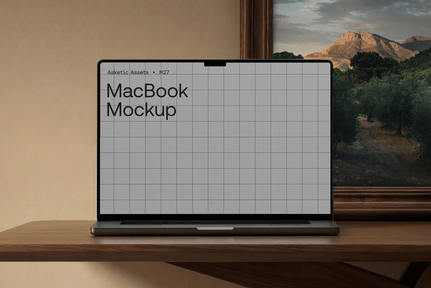 MacBook mockup on wood desk with light gray grid screen, mountain landscape