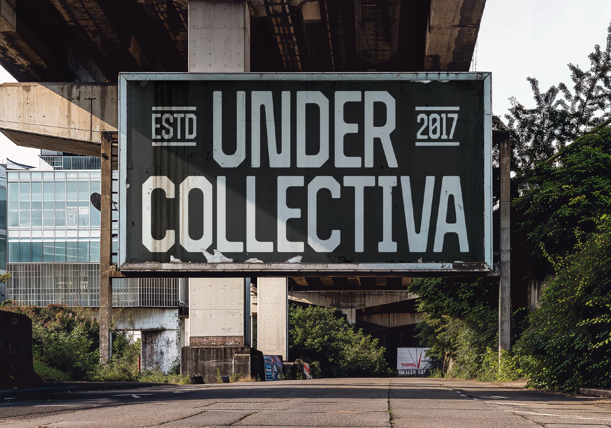 Under Collectiva estd 2017 vintage sign on industrial building facade