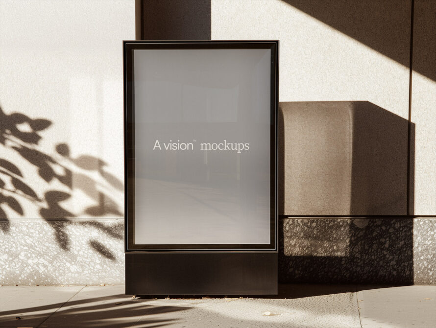 Street billboard mockup with neutral gray screen in bright sunlight