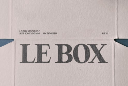 White cardboard box mockup with LE BOX text, flat lay close-up