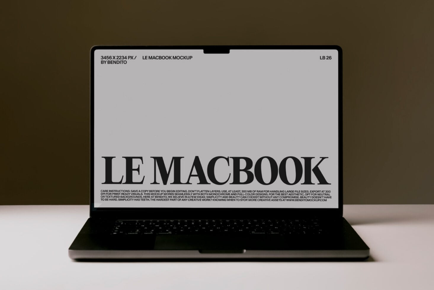 MacBook Pro mockup on warm background showing bold LE MACBOOK title on display