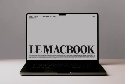 Laptop mockup with LE MACBOOK text centered on screen against neutral background