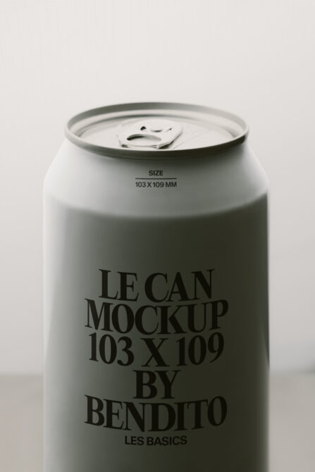 White aluminum beverage can with pull tab displaying centered serif lettering