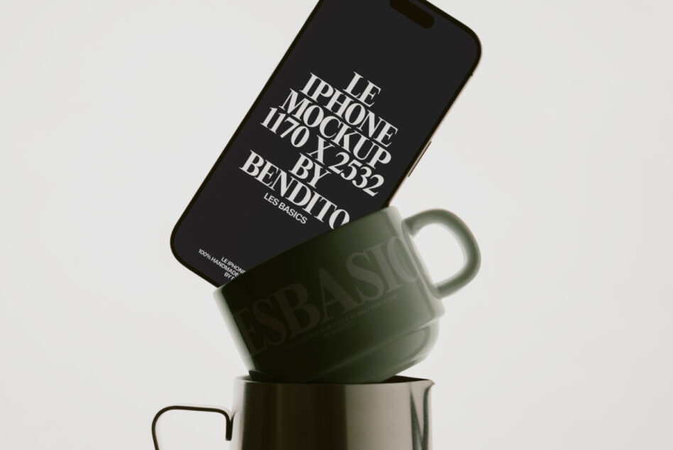 Black iPhone balanced on matte green cup displaying typography mockup layout
