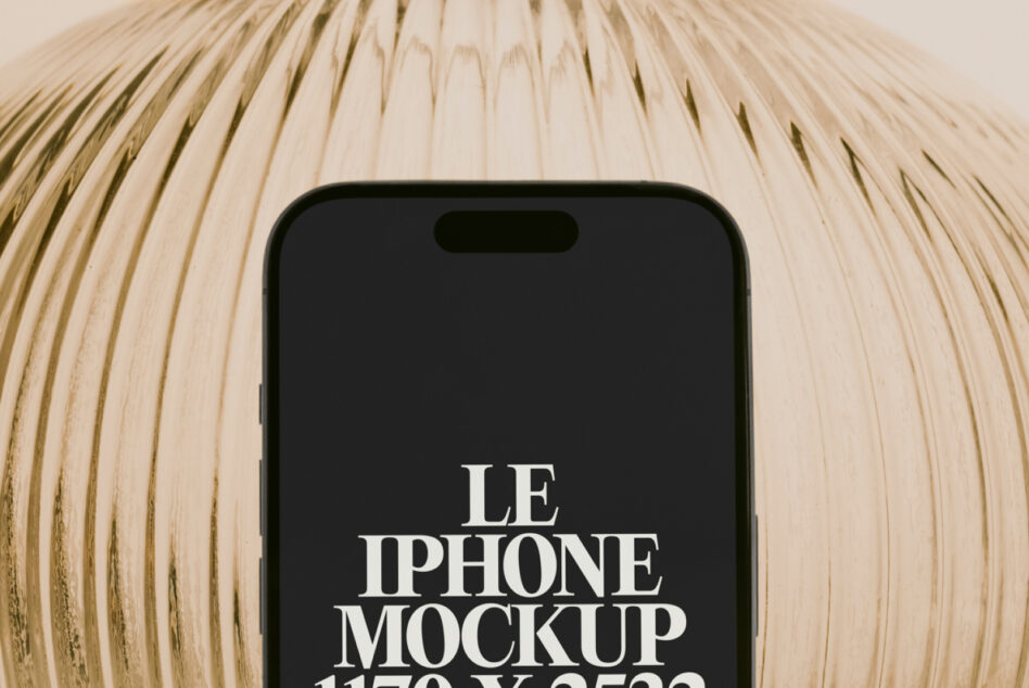 iPhone mockup dark screen held up close to cream textured background
