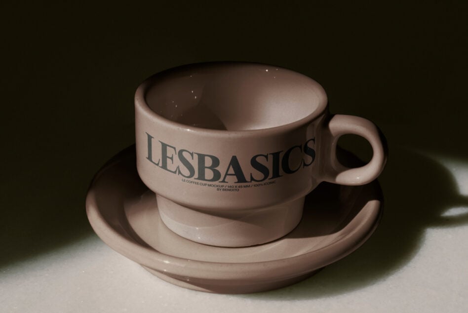 Beige coffee cup with saucer featuring LE BASICS logo in clean typography