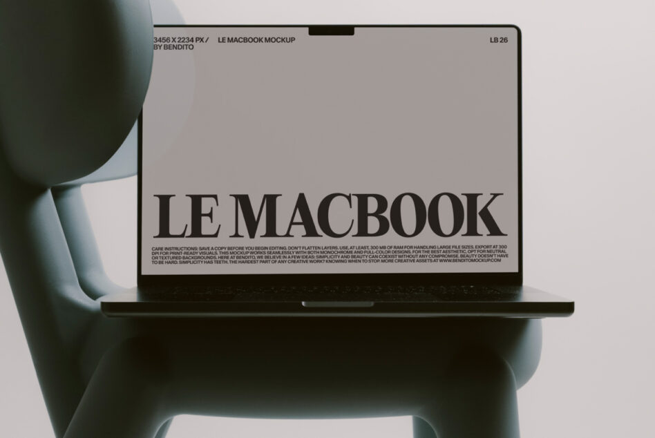 Sculptured soft gray chair holding MacBook with light screen mockup composition
