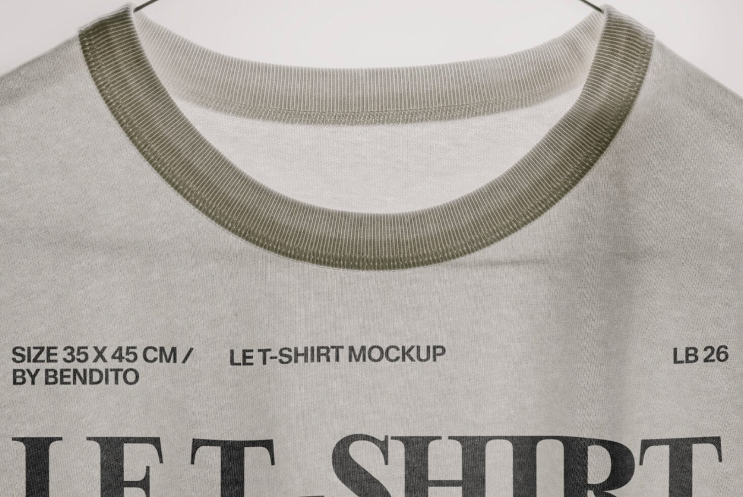 Off-white tee neckline detail with olive ribbed trim