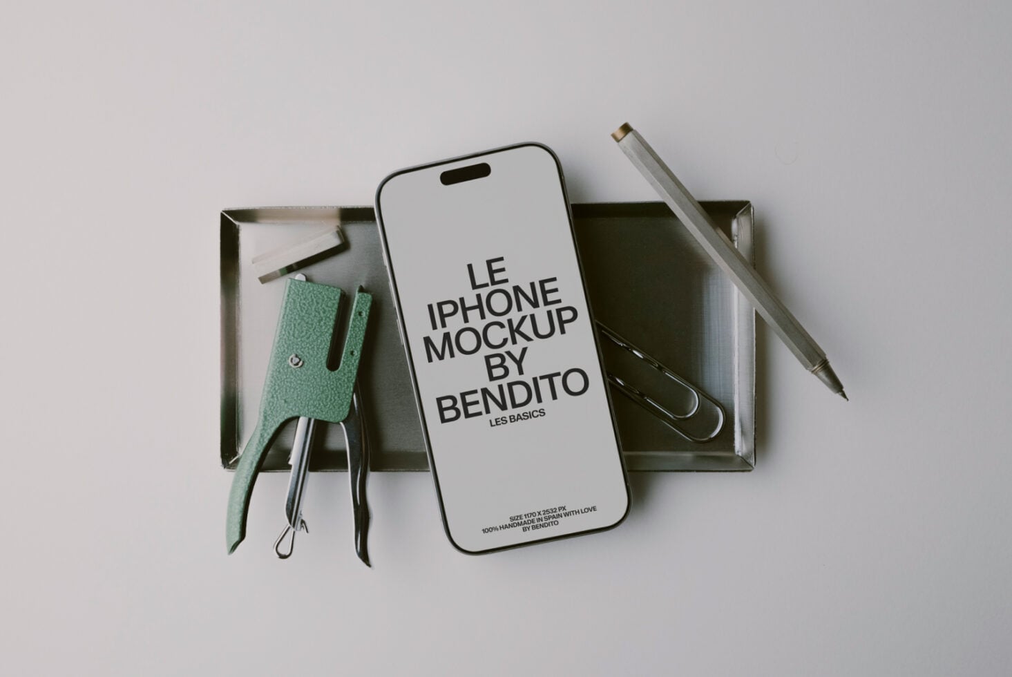 iPhone mockup flat lay with mint green leather phone sleeve, pens, scissors in metal tray