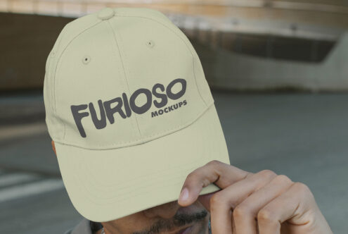 Soft yellow cap showing Furioso Mockups design worn outdoors